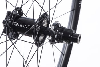 <h1>Rear Hub</h1><i>The demands of modern day Enduro riding are tougher than ever before. The EnduroWide hubs have been chosen to increase stiffness, bearing durability and overall strength of your wheelset. On the rear, the Hunt RapidEngage MTB hubs with a superfast 3 degree engagement, means you will be able to put the power down straight out of the corners.</i>