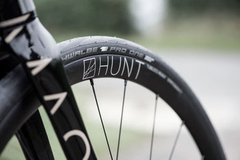 <h1>Rims</h1><i>A strong and lightweight 6061-T6 heat-treated rim features Micro-peened finish strengthens the rim even further. The rim profile is aero-rounded and true disc specific which allows higher-strength to weight as no reinforcement is required for a braking surface, it also looks stunning. The rim dimensions are wide at 22mm (17mm internal) which creates a great tyre profile with wider 23-45mm tyres, giving excellent grip and lower rolling resistance.</i>