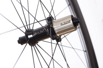 <h1>Hubs</h1><i>Precision machined straight pull hubs and spokes add strength and enhance power transfer meaning all your force pushes you forwards.  Large 15mm diameter hub axles for sprinting and out-of-saddle climbing responsiveness. Circular dropout interface steps add extra stiffness.</i>